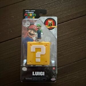 Nintendo Super Mario Bros Luigi Action Figure with Yellow Block